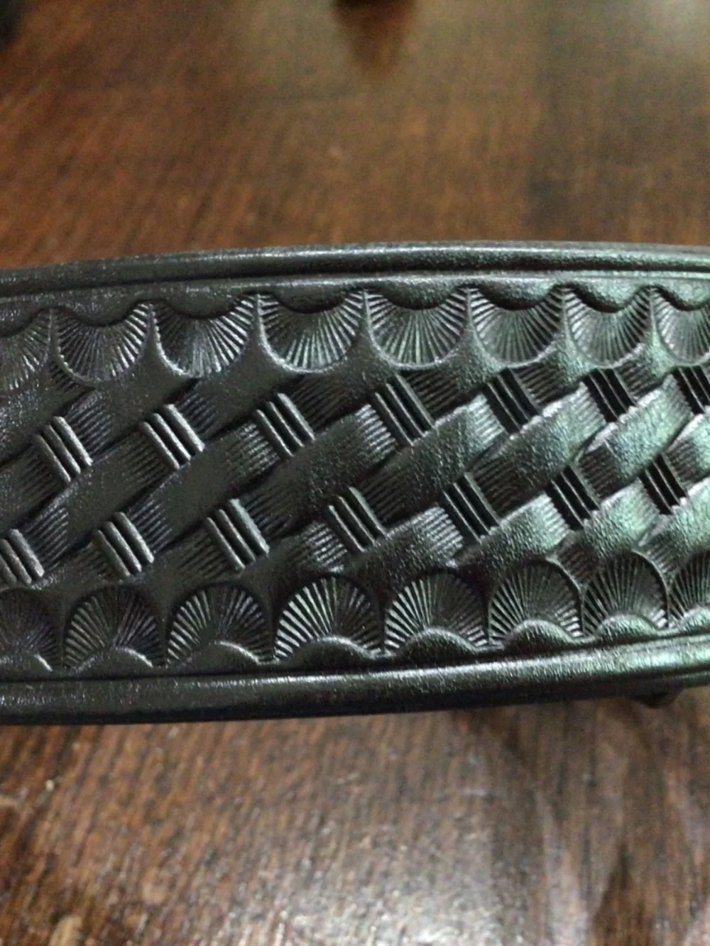 Genuine leather western belt with Silvertone buckle. Size 36.